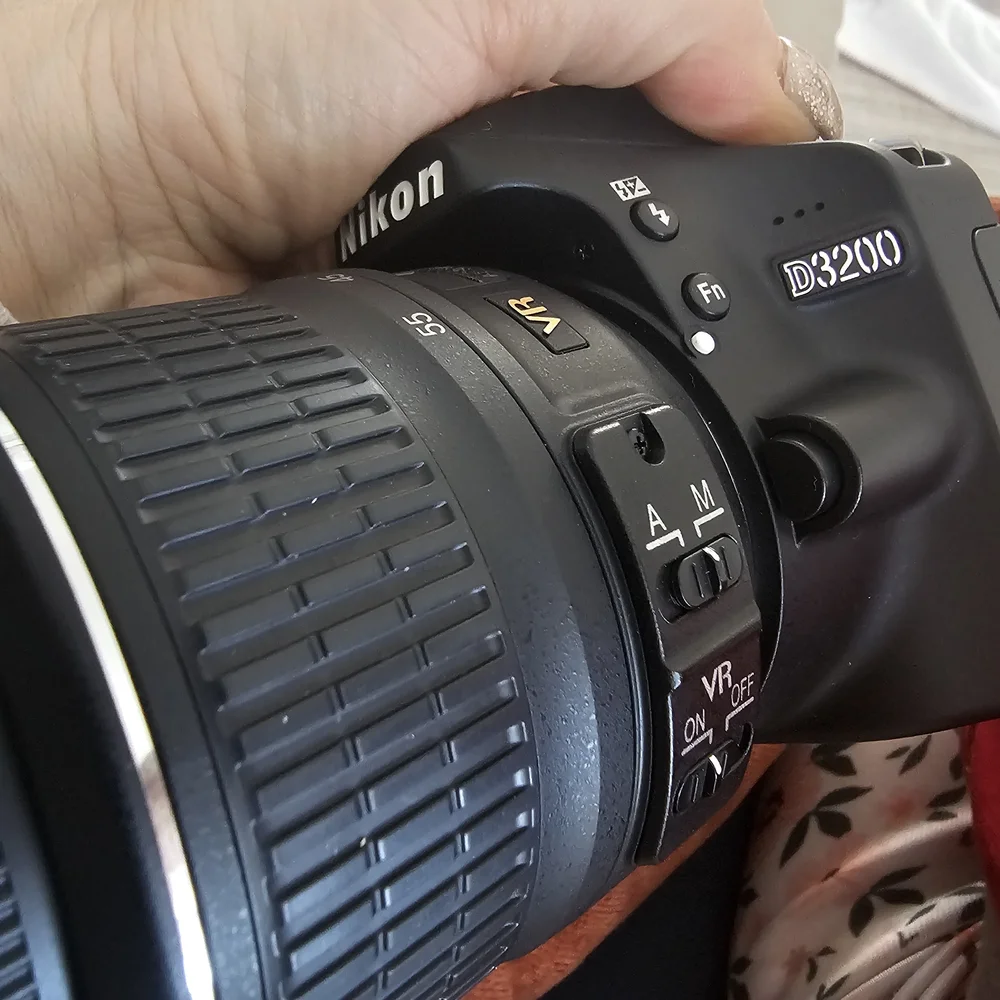 Nikon Black DSLR with Zoom Lens